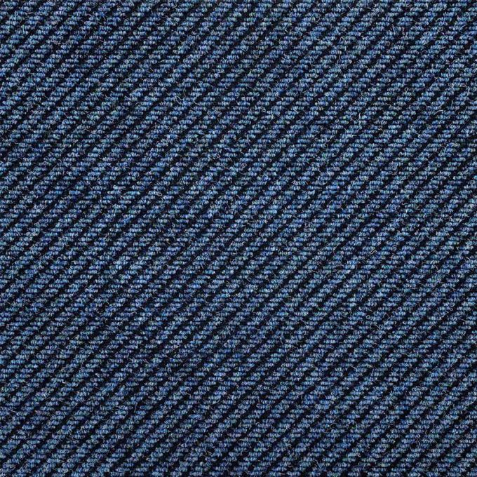 TE12 Deep Ocean is a heavy contract poly/nylon carpet tile. They have been specifically designed to be used as barrier matting carpet tiles. Ideal for entrances, reception areas and doorways. The diagonal grooves that run across the tiles trap dirt and mo