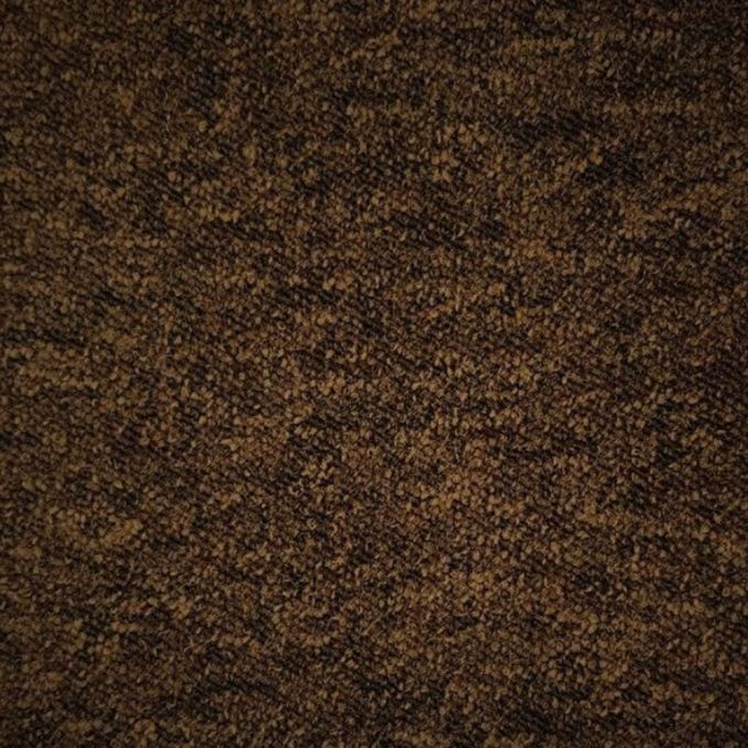 Zetex Enterprise Cocoa Brown Carpet Tiles are a durable option for heavy commercial use. The tufted loop pile with 100% nylon yarn construction creates a comfortable and resilient surface, making it perfect for high-traffic areas. The carpet tiles are ava