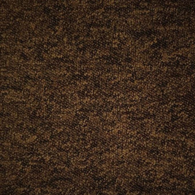 Zetex Enterprise Cocoa Brown Carpet Tiles are a durable option for heavy commercial use. The tufted loop pile with 100% nylon yarn construction creates a comfortable and resilient surface, making it perfect for high-traffic areas. The carpet tiles are ava