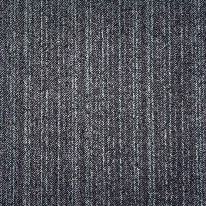 A lighter shade of grey is presented here on an attractive striped pattern. The combination of greys through light to dark blend perfectly to compliment whatever area they are laid in. The tufted loop pile tile structure and the 100% nylon build adds comf