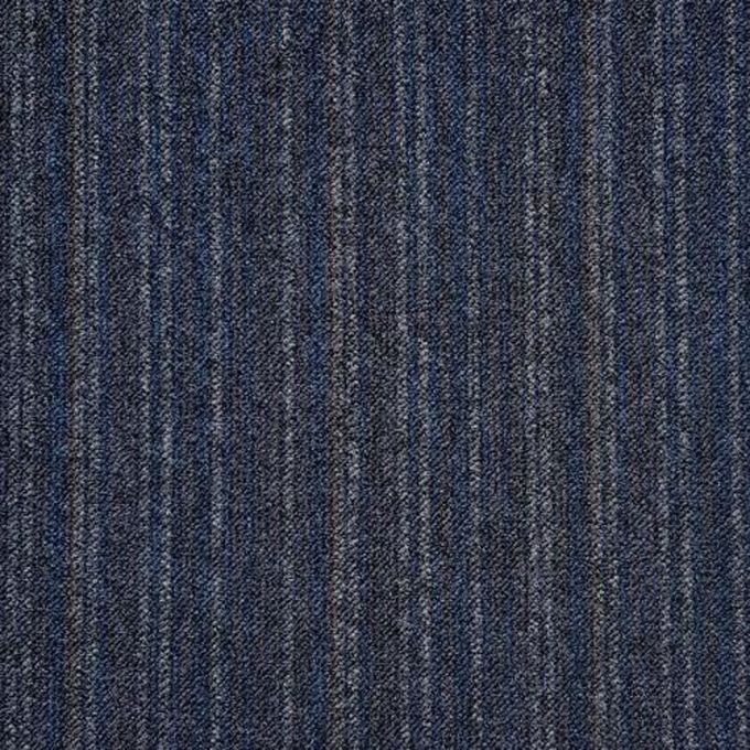 Zetex Constellation 610 Shannon – Graded Heavy Contact Carpet Tiles
The constellation Shannon carpet tile combines an array of colours of dark blue, light grey and a dark grey to create a stunning striped pattern. The yarn construction of the tile is 100