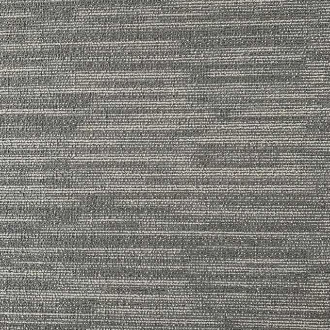 The SPL65 Ghost Castor carpet tiles are the perfect solution for high-traffic commercial environments. These carpet tiles are constructed with a durable tufted loop pile made from 100% nylon material, ensuring longevity and resilience against wear and tea