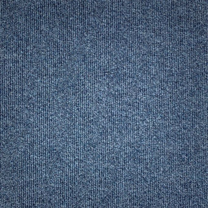The Zetex Yukon Rib Calcium carpet tile is a durable and resilient flooring option that is perfect for high-traffic commercial and industrial spaces. The carpet tile's ribbed design is achieved through needlefelt technology and is made from 100% polypropy